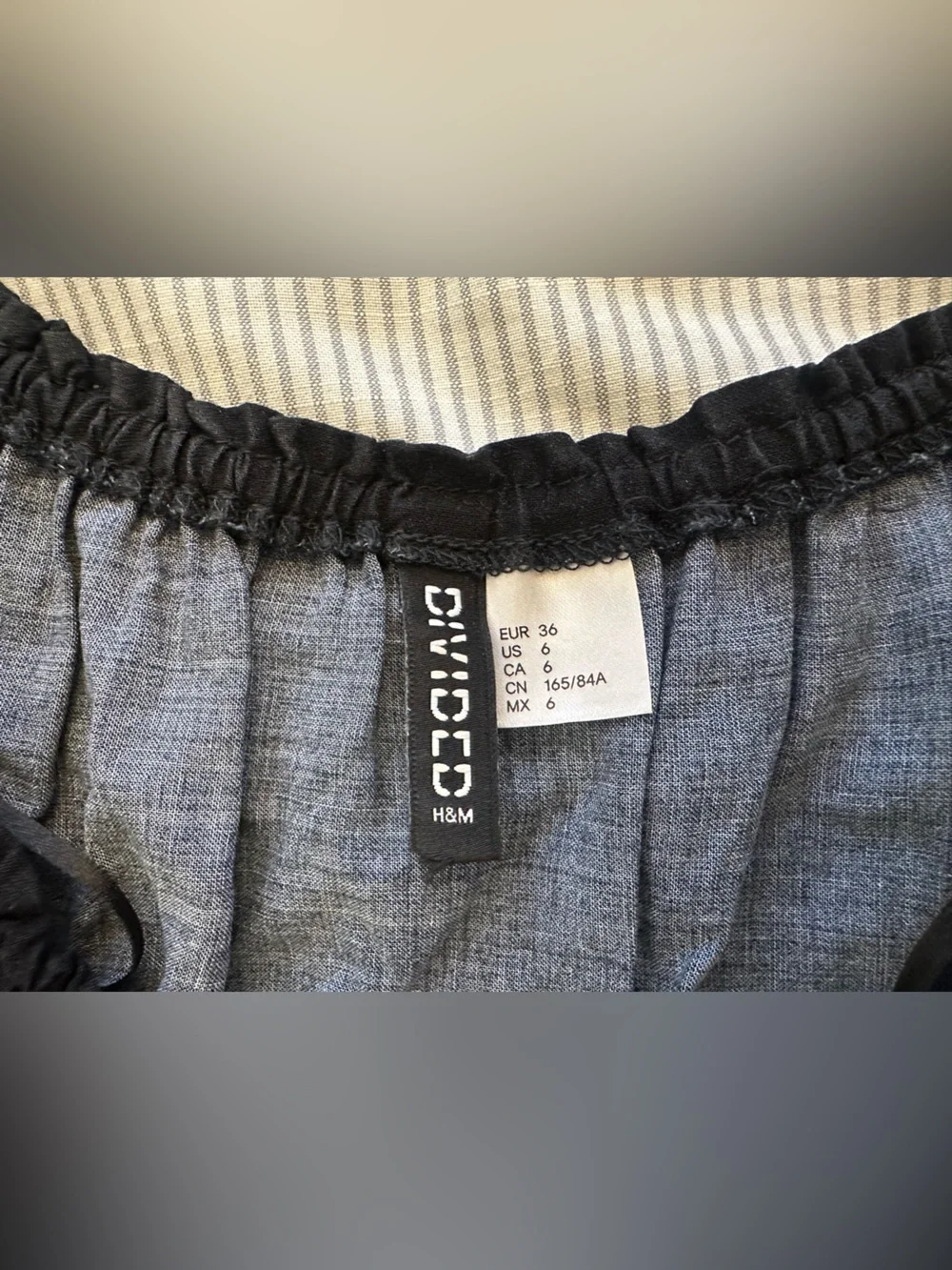H&M Black Off-Shoulder Crop Top with Colorful Floral Detail